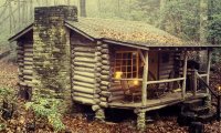 Log cabin in the rain