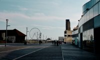 You're a lone writer at a pub by the boardwalk, people watching and trying to catch your big idea.