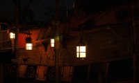 A docked ship at night