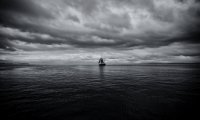 On a Ship at Sea with Distant Storms