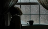 Watching the Rain Through a Window