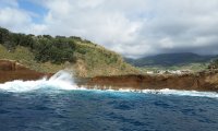 Waves On A Cliff