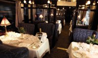 Taking a meal aboard a luxurious steam train