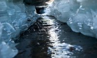 Exploring a magical ice cave in the deep of winter.