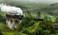 Travelling on a steam train in stormy and rainy weather