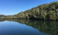 sitting on the bridge at Melton Lake