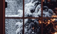 Cozy cabin in snowstorm