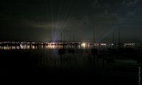 Sitting besides the lake at nighttime