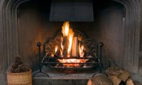 Sitting by the fireplace during a thunderstorm