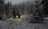 Winter Cabin at Night During a Storm