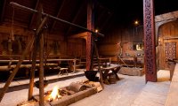 Meal around a crackling fire during a snowstorm