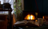 Cuddling by a fire on a snowy night