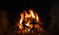 Reading By Firelight Inside An Old Castle Room