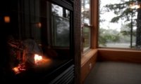 Cozy Fireplace in a Rainstorm