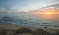 Walk on the beach at sunset