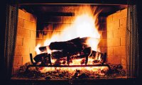 Fireplace with rain outside