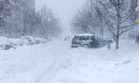 Trudging through a blowing blizzard