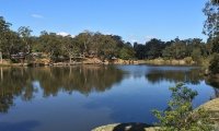 sitting by a lake river