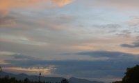 A storm approaches in a quiet rural setting